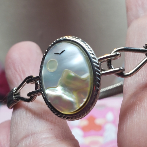 Silvertone bangle bracelet with a mother-of-pearl Inlay of a sun, bird & mountai - Picture 5 of 14